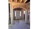 Unfinished front entryway featuring arched framing and a white entry door at 235 Meadowbark Bnd # 26, Garner, NC 27529