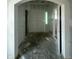 Bright entryway with white doors and an arched doorway in a newly constructed home at 235 Meadowbark Bnd # 26, Garner, NC 27529