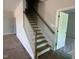Stairway featuring wood treads and white risers leading to the upper level of the home at 235 Meadowbark Bnd # 26, Garner, NC 27529