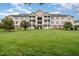 Inviting multi-story condo complex boasts well-maintained landscaping and classic architectural details at 3009 Winston Dr # 90, Burlington, NC 27215