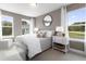 Cozy bedroom featuring neutral tones, plush carpet, and coordinated decor at 341 Church St # 67, Wendell, NC 27591