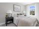 Comfortable bedroom featuring soft textures, neutral colors, and bright natural lighting at 341 Church St # 67, Wendell, NC 27591