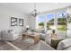 Bright living room filled with natural light features stylish furnishings, decor, and a large area rug at 341 Church St # 67, Wendell, NC 27591