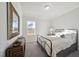 Bedroom featuring a decorative mirror, natural light, and neutral tones at 3701 Massey Pond Trl # Leighton, Raleigh, NC 27616