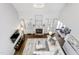Bright living room with a fireplace, chandelier, a large sofa, and hardwood floors at 4270 Aviemore Run, Burlington, NC 27215