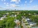 An aerial view of the neighborhood with the city skyline in the distance at 5 Bart St, Raleigh, NC 27610