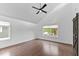 Bright bedroom with vaulted ceiling, ceiling fan, and two windows providing natural light and comfort at 5 Bart St, Raleigh, NC 27610