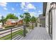 View from the spacious deck featuring neighborhood views, gray railings, and a gray deck floor at 5 Bart St, Raleigh, NC 27610