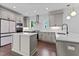 Spacious kitchen featuring an island, modern appliances, and ample countertop space at 5 Bart St, Raleigh, NC 27610