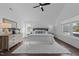 Bright main bedroom with stylish decor, ceiling fan, and natural light, creating a relaxing atmosphere at 5 Bart St, Raleigh, NC 27610