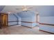 This spacious room features a unique ceiling, neutral carpet, trim, and a window at 5405 Friendship Patterson Mill Rd, Burlington, NC 27215