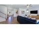 Inviting living room featuring an open layout, hardwood floors, and plenty of natural light at 627 Contento Ct, Sanford, NC 27330