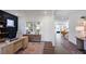 Office space features wood floors, a blue accent wall and an area rug at 627 Contento Ct, Sanford, NC 27330