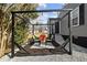 Backyard patio features a pergola with seating area for relaxation and entertaining at 704 Dothan Ave, Burlington, NC 27217