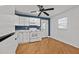 Bright kitchen features white cabinetry, modern appliances, and a window for natural light at 704 Dothan Ave, Burlington, NC 27217