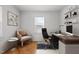 Well-appointed home office with modern furniture, stylish decor, and great natural light at 704 Dothan Ave, Burlington, NC 27217
