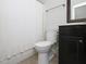 Cozy bathroom featuring a vanity, toilet, and shower with a white patterned curtain at 800 Tree Green Ln, Wake Forest, NC 27587