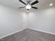This bright bedroom features a neutral color scheme and includes a ceiling fan at 800 Tree Green Ln, Wake Forest, NC 27587