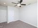 Neutral painted bedroom features two doors and a ceiling fan for added comfort at 800 Tree Green Ln, Wake Forest, NC 27587