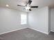 A well-lit bedroom with neutral walls, ceiling fan, and carpet at 800 Tree Green Ln, Wake Forest, NC 27587