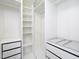 This custom walk-in closet is equipped with shelves, drawers and ample storage at 800 Tree Green Ln, Wake Forest, NC 27587
