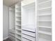 This walk-in closet has custom shelves, drawers and plenty of space for storage at 800 Tree Green Ln, Wake Forest, NC 27587