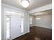 Bright foyer leading to the dining room featuring hardwood floors and a chandelier at 800 Tree Green Ln, Wake Forest, NC 27587