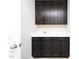 Stylish laundry room features dark wood cabinetry, a white countertop, and a sleek sink with modern fixtures at 800 Tree Green Ln, Wake Forest, NC 27587