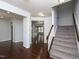 Open floor plan featuring hardwood floors, neutral paint, and stairway access at 800 Tree Green Ln, Wake Forest, NC 27587