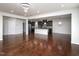 Open concept living area with a kitchen island, hardwood floors, and recessed lighting at 800 Tree Green Ln, Wake Forest, NC 27587