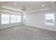 Large main bedroom features large windows and a decorative ceiling fan for comfort at 800 Tree Green Ln, Wake Forest, NC 27587