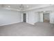 Large carpeted main bedroom features closets and entryways to other areas of the home at 800 Tree Green Ln, Wake Forest, NC 27587