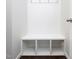 Bright mudroom features a built-in bench with cubbies and coat hooks for organization at 800 Tree Green Ln, Wake Forest, NC 27587