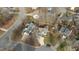 Aerial view showcasing the property's location within a neighborhood with mature trees and well-kept yards at 886 Drogheda Pl, Wake Forest, NC 27587