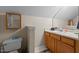 Clean bathroom featuring vanity with sink, toilet and mirror at 886 Drogheda Pl, Wake Forest, NC 27587