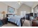 Comfortable bedroom with a vaulted ceiling, carpet and well-lit with large windows at 886 Drogheda Pl, Wake Forest, NC 27587