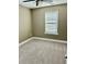 Bedroom with carpet, ceiling fan, and window at 9200 Torre Del Oro Pl, Raleigh, NC 27617