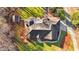 Stunning aerial view of a home showcasing its backyard, patio, and manicured lawn at 1002 Pleasant Dr, Mebane, NC 27302