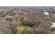 A beautiful aerial view of a sprawling acreage featuring mature trees and estimated property lines at 1002 Pleasant Dr, Mebane, NC 27302