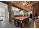Basement space featuring pool table and partial views into the adjacent rec room at 1002 Pleasant Dr, Mebane, NC 27302