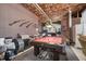 Basement area featuring exposed duct work and a pool table in a partially finished space at 1002 Pleasant Dr, Mebane, NC 27302