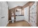 Neutral colored bathroom featuring vanity with granite top, tile floors, a toilet, and shower with patterned shower curtain at 1002 Pleasant Dr, Mebane, NC 27302