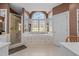Relaxing bathroom with a soaking tub, a walk-in shower, and a large window at 1002 Pleasant Dr, Mebane, NC 27302