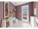 Stylish bathroom with a pedestal sink and modern fixtures at 1002 Pleasant Dr, Mebane, NC 27302