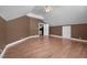 Another spacious bonus room featuring hardwood floors and an open floor plan at 1002 Pleasant Dr, Mebane, NC 27302