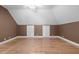 Additional bonus room with plenty of space, hardwood floors, and neutral paint at 1002 Pleasant Dr, Mebane, NC 27302