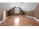 Huge bonus room featuring hardwood floors and a large window at 1002 Pleasant Dr, Mebane, NC 27302