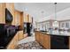 Kitchen featuring a large island with seating, modern appliances, and ample counter space at 1002 Pleasant Dr, Mebane, NC 27302