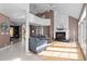 Spacious living room featuring a fireplace, large windows, and an open floor plan at 1002 Pleasant Dr, Mebane, NC 27302