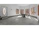 Sun Room featuring walls of windows, tile flooring, and a table with chairs at 1002 Pleasant Dr, Mebane, NC 27302